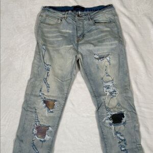 AMIRI Distressed Light Blue Jeans with Colorful Patches!
